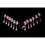 A VICTORIAN SET OF TWELVE TEASPOONS, with matching sugar tongs,