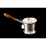 A GEORGE III SILVER BRANDY WARMER, plain circular form, with turned fruit wood handle,