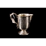 A VICTORIAN SILVER CREAM JUG, Birmingham 1860,