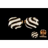 A PAIR OF 18CT GOLD CUFFLINKS, finished with black and white striped enamel,