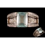 AN AQUAMARINE DRESS RING,