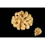 AN 18CT GOLD FLOWER STYLE DRESS RING SIGNED BULGARI.