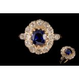 A SAPPHIRE AND DIAMOND CLUSTER RING, with sapphire of approx. 1.50ct, diamonds of approx. 0.