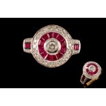 A RUBY AND DIAMOND TARGET RING, with rubies of approx. 0.75ct, diamonds of approx. 0.