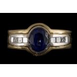 A SAPPHIRE AND DIAMOND SET RING, with princess cut diamond shoulders,