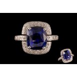 A SAPPHIRE AND DIAMOND BOODLES RING, with documentation stating the sapphire to be 5.