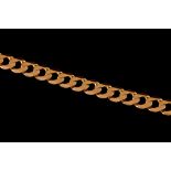 A 9CT YELLOW GOLD CURB LINK BRACELET