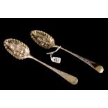 A PAIR OF GEORGIAN SILVER GILT BERRY SPO