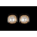 A PAIR OF MABÉ PEARL AND ONYX EARRINGS, pin and omega clip fittings.
