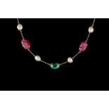 AN EMERALD RUBY AND PEARL NECKLACE, twelve polished emeralds,