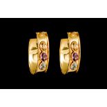 A PAIR OF 18CT GOLD HOOPS, set with citrine,