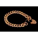 AN ANTIQUE CURB LINK BRACELET, 9ct gold hollow and textured links,