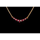 A RUBY AND DIAMOND NECKLACE, set with marquise cut rubies and brilliant cut diamonds,
