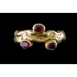 A RUBY DRESS RING, mounted on 18ct gold, stamped 'MR',