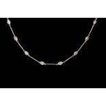 A DIAMOND LINK NECKLACE IN PLATINUM, with marquise brilliant cut diamonds of approx. 3.