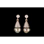 A PAIR OF GREY PEARL DROP EARRINGS, the pearls suspended from brilliant cut diamond states,
