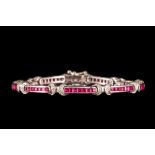 A RUBY AND DIAMOND BRACELET, with rubies of approx. 3.00ct in total, diamonds of approx. 0.