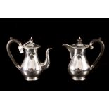 A PAIR OF MODERN PRE-WAR SILVER COFFEE POT AND HOT WATER POT, of plain baluster form,