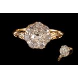 A LATE VICTORIAN DIAMOND ROUND CLUSTER RING, with old cut diamonds of approx. 1.