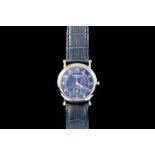 A GENTS RAYMOND WEIL WRIST WATCH, with blue face and separate minute dial, leather strap,