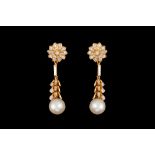 A PAIR OF CULTURED PEARL AND DIAMOND DROP EARRINGS, two cultured pearls of 9½mm - 10mm each,