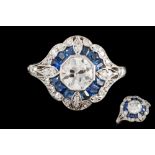 A SAPPHIRE AND DIAMOND FANCY TARGET RING, with old European brilliant cut diamond of approx. 0.