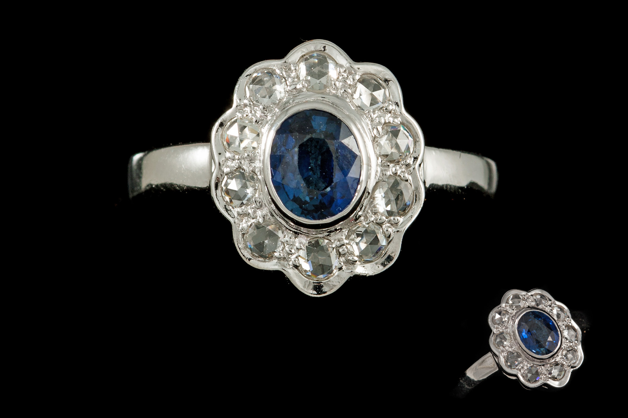 A SAPPHIRE AND DIAMOND CLUSTER RING, with rose cut diamonds,