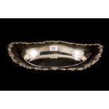 AN OVAL SHAPED SILVER DISH, with applied border, Birmingham 1945,