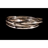 A TRIPLE SILVER BANGLE