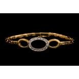 AN 18CT YELLOW GOLD FLEXIBLE BRACELET, triple oval design,