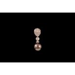 A BLACK CULTURED PEARL DROP PENDANT, mounted in 14ct white gold,