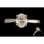 A DIAMOND SOLITAIRE RING, with oval cut diamond of approx. 0.