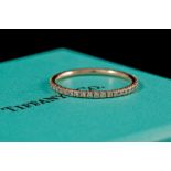 A TIFFANY & CO 'METRO' DIAMOND FULL ETERNITY RING, of approx. 0.