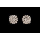 A PAIR OF DIAMOND CLUSTER EARRINGS,