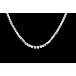 A DIAMOND GRADUATED RIVIERE NECKLACE, set throughout with round brilliant cut diamonds of approx 11.