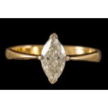 A DIAMOND SOLITAIRE RING, with marquise cut diamond of approx.