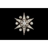 A VICTORIAN DIAMOND STAR PENDANT BROOCH,