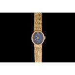 A 9CT YELLOW GOLD LADIES MISS TUDOR WRIST WATCH, with 9ct gold woven bracelet,