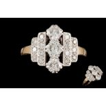 A DIAMOND DRESS RING, with three round brilliant cut diamonds along centre,