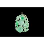 A CARVED JADE PENDANT, rectangular openwork pendant with diamond set bale.