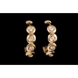 A PAIR OF DIAMOND SET EARRINGS,