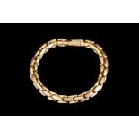 AN 18CT YELLOW GOLD ROUND LINK BRACELET