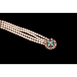 A FOUR ROW CULTURED PEARL NECKLACE, with gem set clasp,