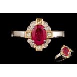 A RUBY DRESS RING,