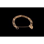 A 9CT YELLOW GOLD GATE BRACELET,