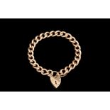 A 9CT YELLOW GOLD CURB LINK BRACELET,