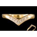 A DIAMOND SET WISHBONE RING,