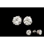 A PAIR OF DIAMOND SOLITAIRE STUD EARRINGS, two old European brilliant cut diamonds of approx 2.