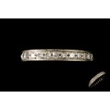 A DIAMOND ETERNITY RING,