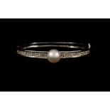 A PEARL AND DIAMOND BANGLE,